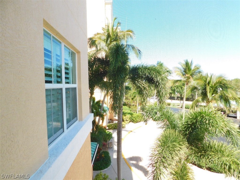2090 Matecumbe Key Road, Unit 1307 Punta Gorda, FL 33955 - Photo 16 of 25 a balcony with lake view