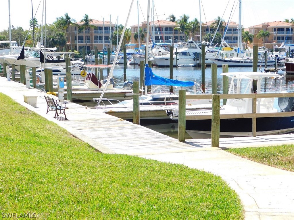 2090 Matecumbe Key Road, Unit 1307 Punta Gorda, FL 33955 - Photo 22 of 25 a view of a swimming pool with outdoor seating