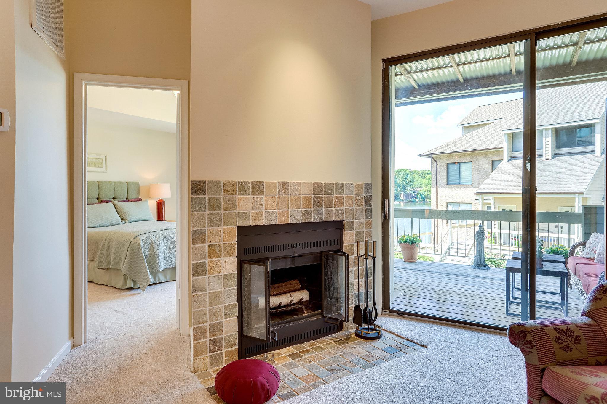 11222 Harbor Court Reston, VA 20191 - Photo 24 of 58 Cozy Fireplace and Sliding Glass Doors to Balcony
