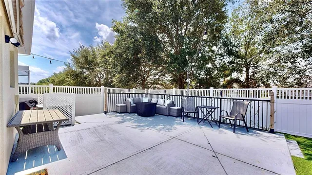 a view of a balcony with chairs