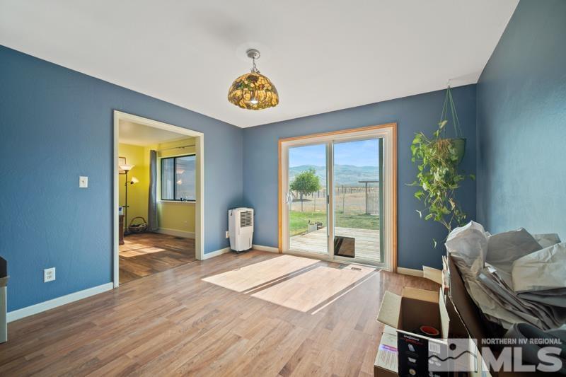 5100 Amy Road Reno, NV 89510 - Photo 10 of 35 a view of a room with a window and wooden floor