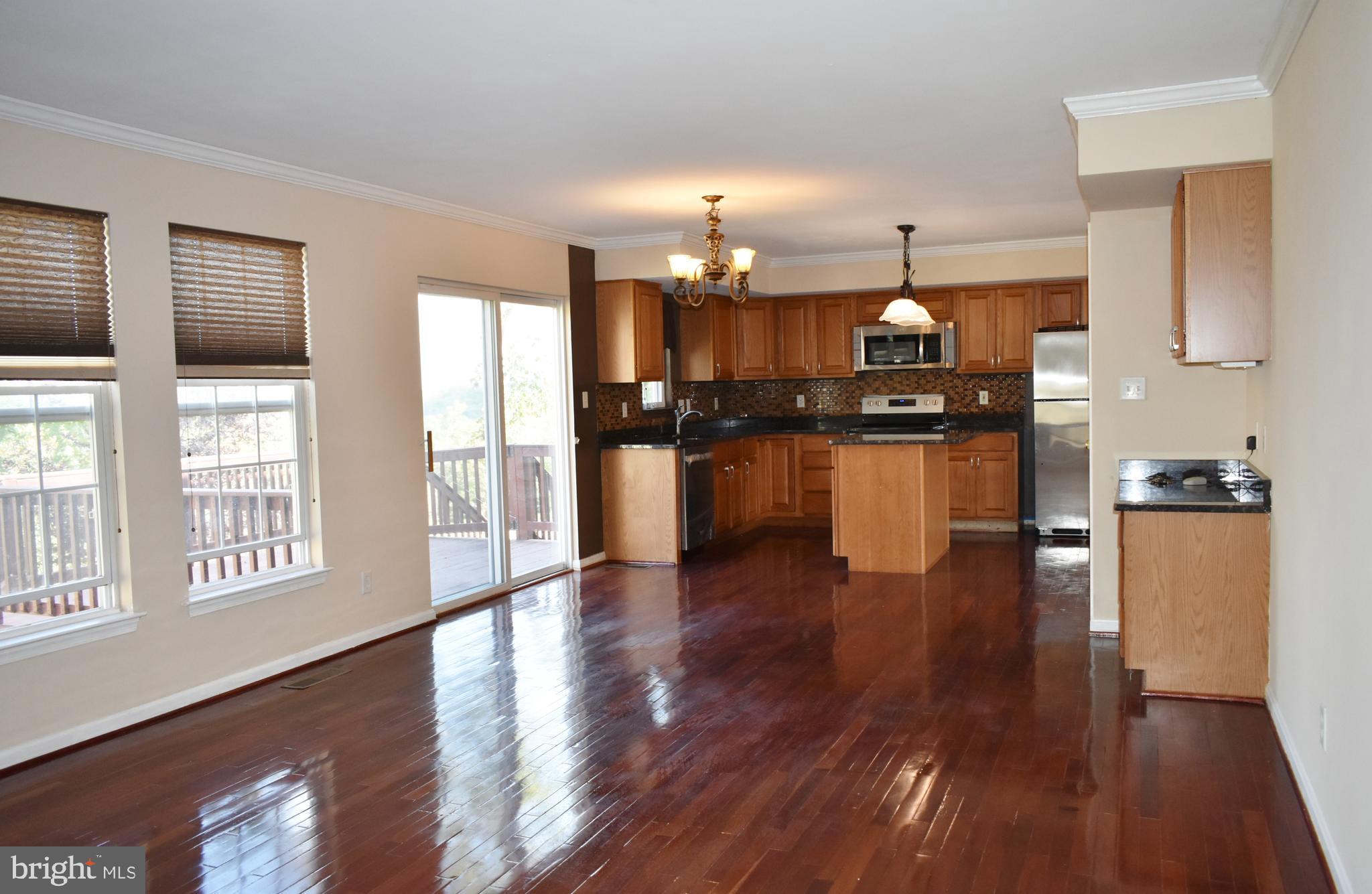 5942 Florey Road Hanover, MD 21076 - Photo 3 of 22 Expansive kitchen with Dining Area & Family Room