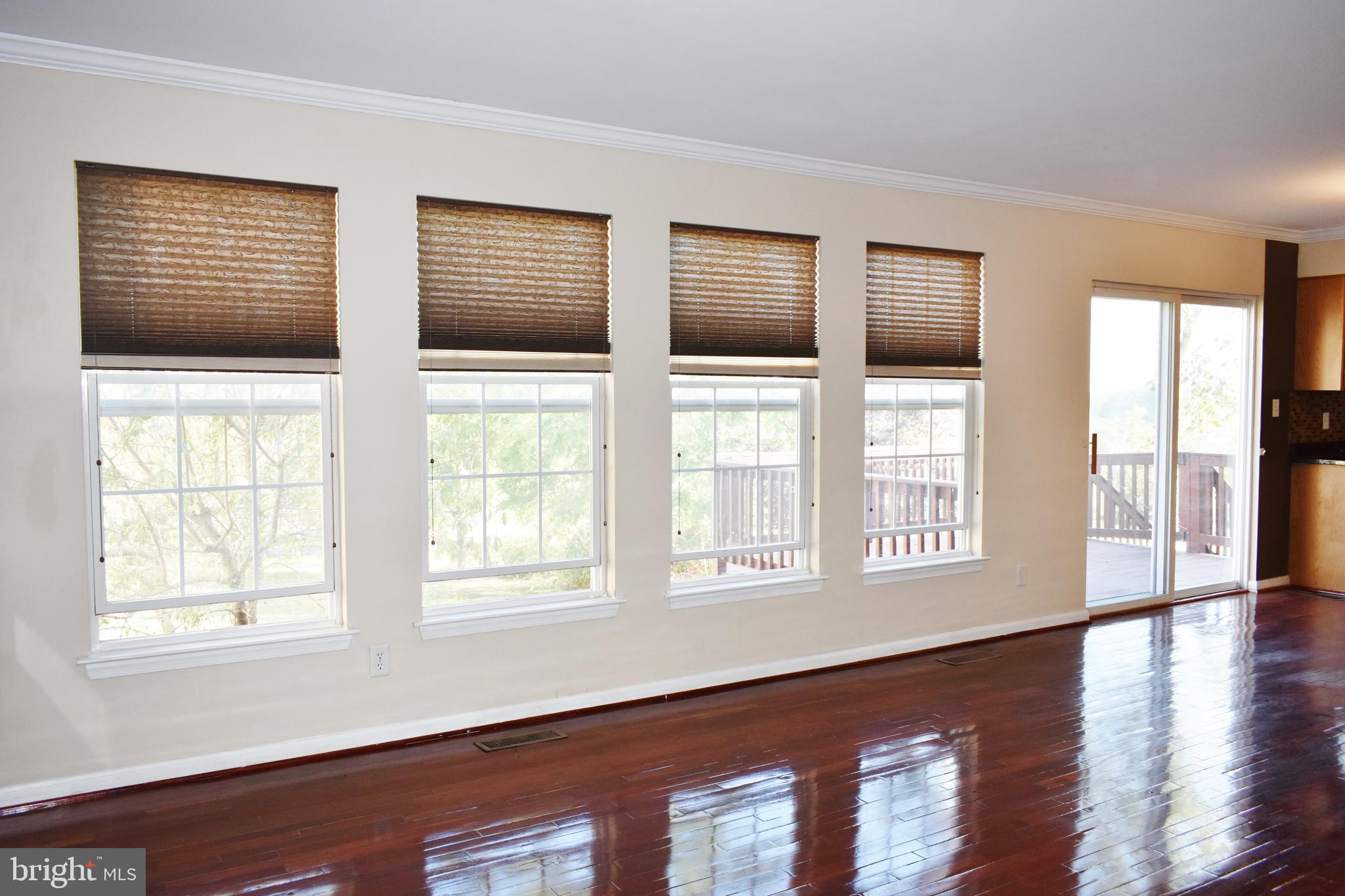 5942 Florey Road Hanover, MD 21076 - Photo 5 of 22 Brazilian Cherrywood Floors throughout main level