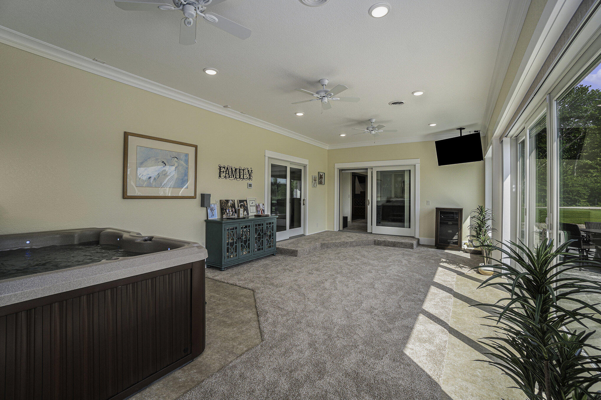 5859 Potter Road Onekama, MI 49675 - Photo 20 of 85 4 season rec room with hot tub