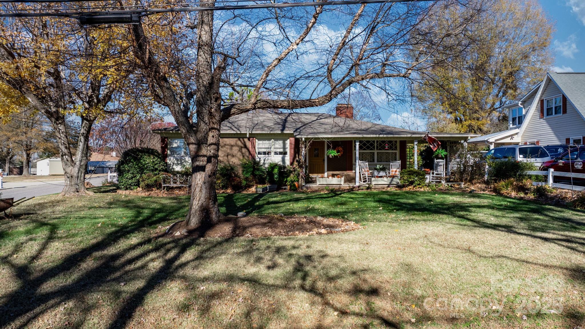 901 Union Street Maiden, NC 28650 - Photo 2 of 37 a view of a house with garden and trees