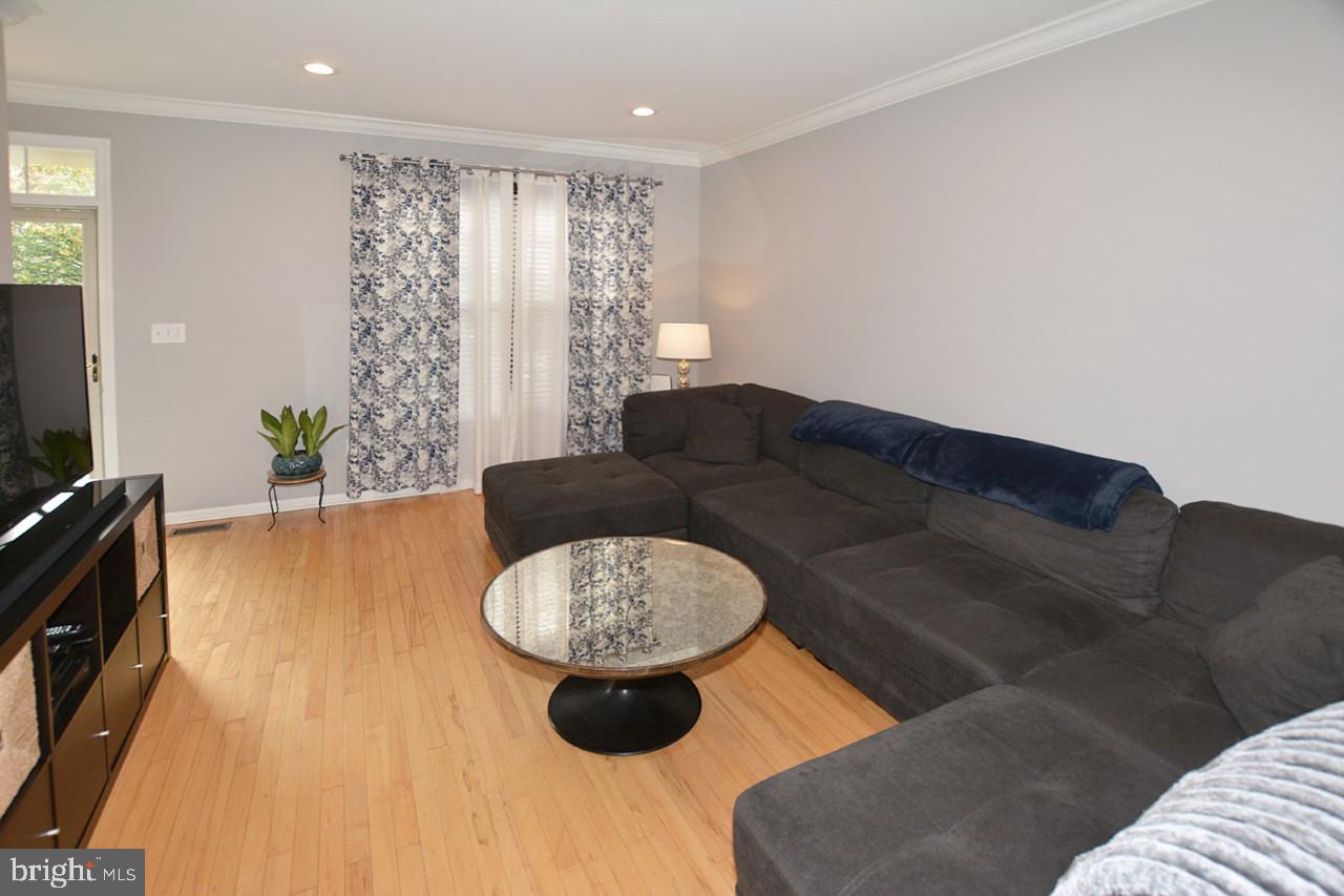 1272 Vintage Place Reston, VA 20194 - Photo 5 of 55 Living area on main level with hardwood floors