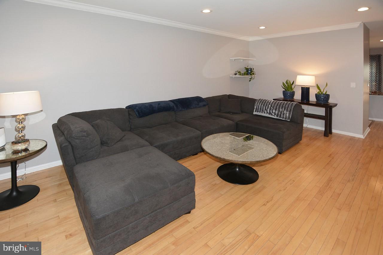 1272 Vintage Place Reston, VA 20194 - Photo 6 of 55 Living room with maple hardwood floors