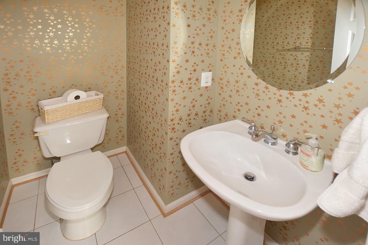 1272 Vintage Place Reston, VA 20194 - Photo 7 of 55 Guest half bath on main floor