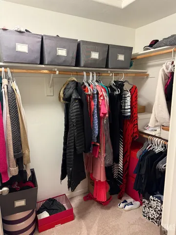 a close up view of walk in closet