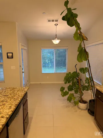 a vase of flowers sitting on a table