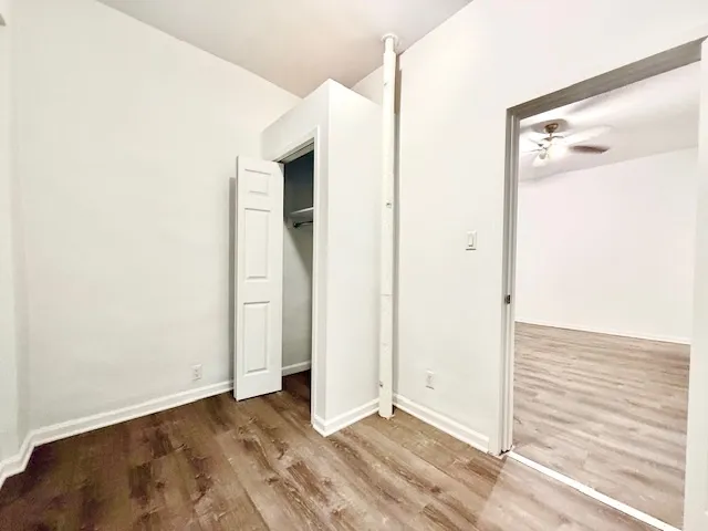 a kitchen with stainless steel appliances a stove microwave and sink