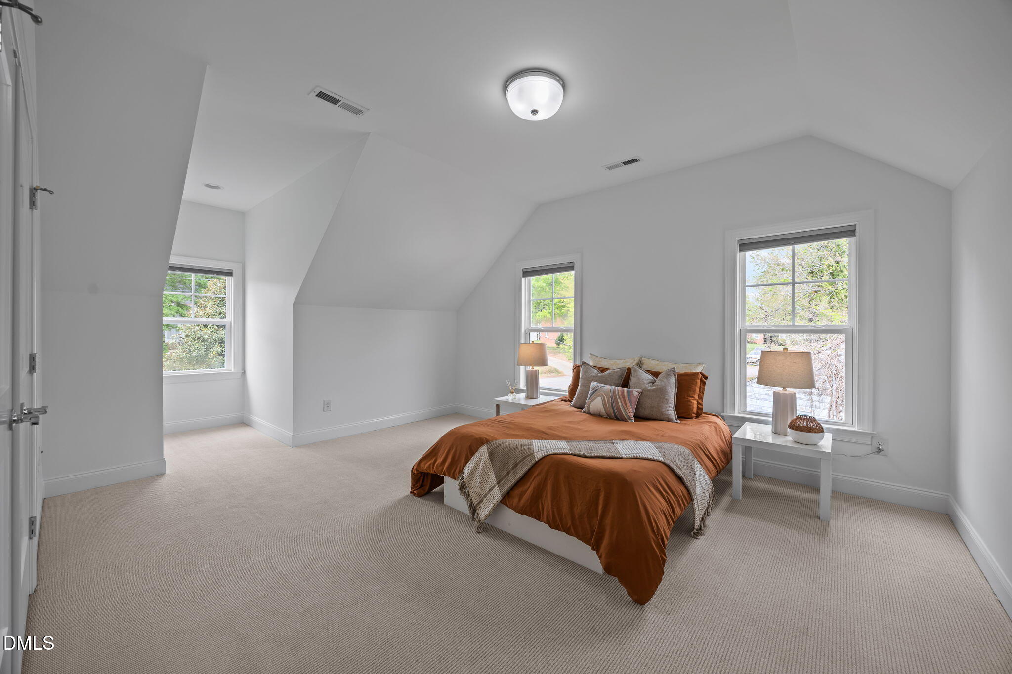 804 Hartford Road Raleigh, NC 27610 - Photo 18 of 26 a bedroom with a bed and window