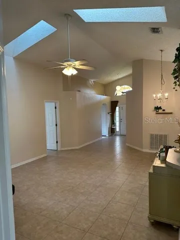 a view of a livingroom with a ceiling fan