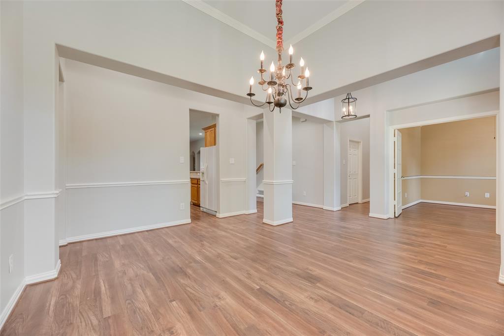 1522 Farm Dale Allen, TX 75002 - Photo 17 of 40 wooden floor in an empty room with a window