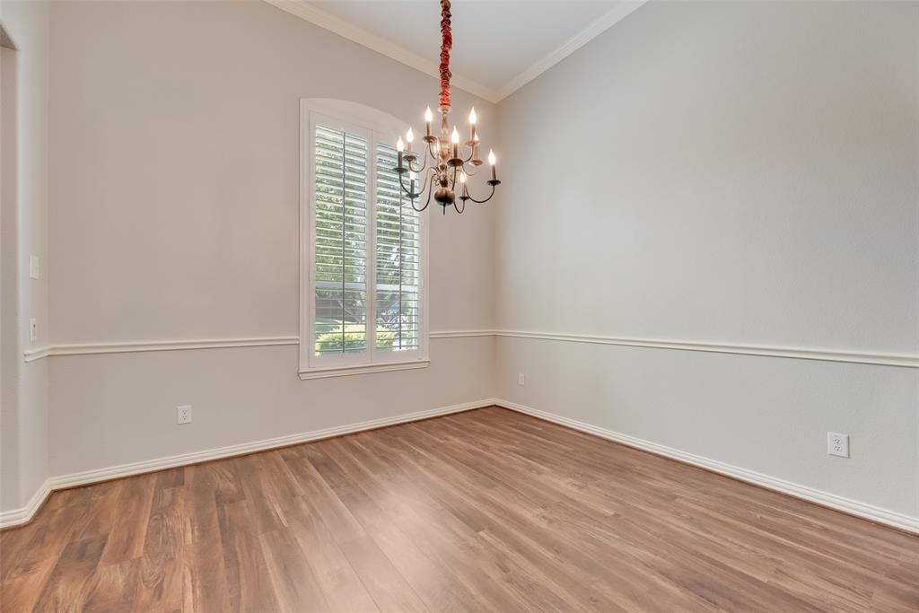 1522 Farm Dale Allen, TX 75002 - Photo 18 of 40 a view of a room with window wooden floor and windows