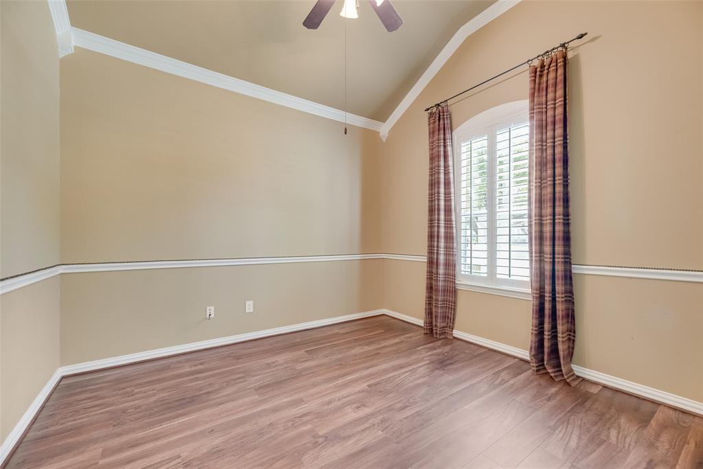 1522 Farm Dale Allen, TX 75002 - Photo 20 of 40 an empty room with wooden floor and windows