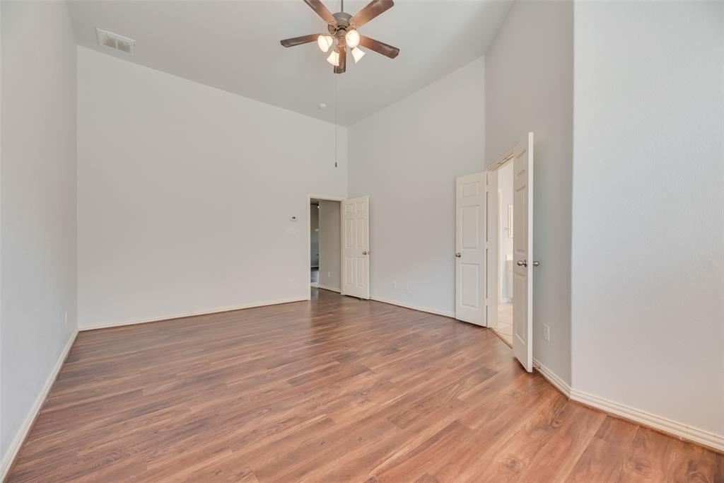 1522 Farm Dale Allen, TX 75002 - Photo 22 of 40 a view of an empty room with wooden floor