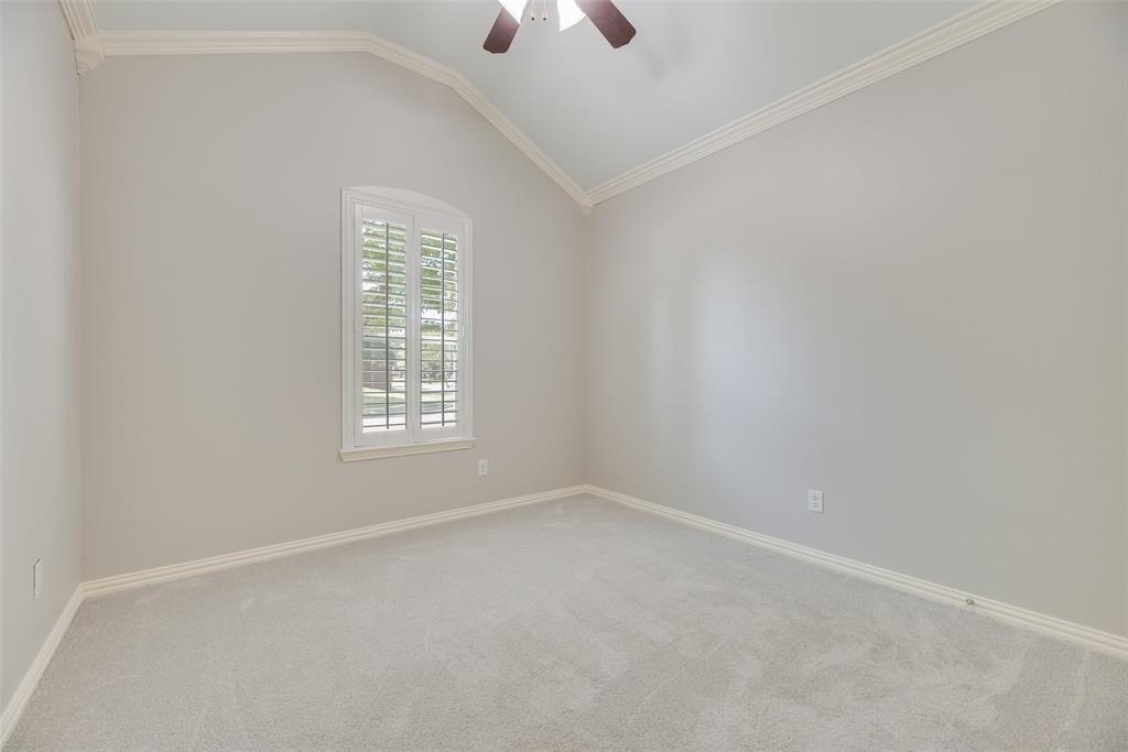 1522 Farm Dale Allen, TX 75002 - Photo 27 of 40 an empty room with a window and a ceiling fan