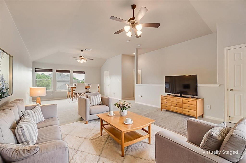 1522 Farm Dale Allen, TX 75002 - Photo 8 of 40 a living room with furniture and a flat screen tv