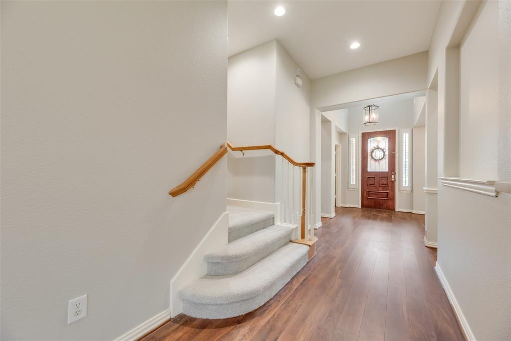 1522 Farm Dale Allen, TX 75002 - Photo 10 of 40 wooden floor in an empty room with a window