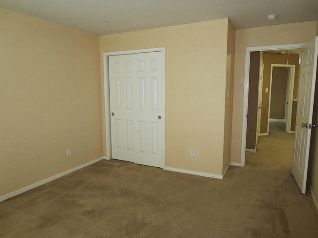 22303 Bridgestone Ridge Drive Spring, TX 77389 - Photo 18 of 25 an empty room with closet area