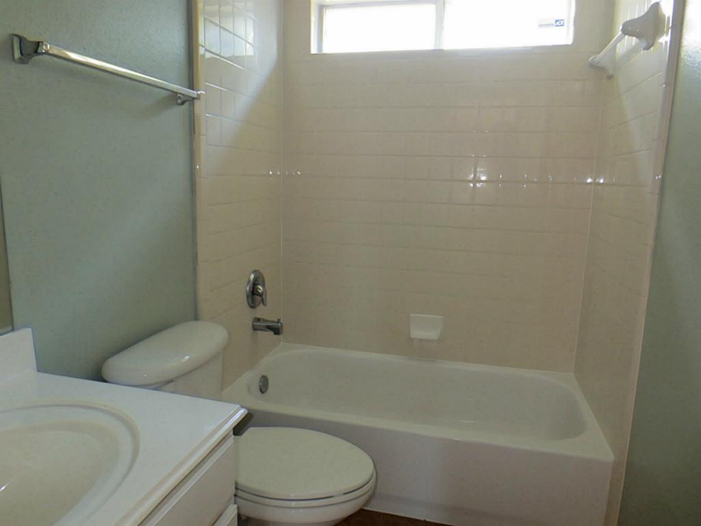 22303 Bridgestone Ridge Drive Spring, TX 77389 - Photo 21 of 25 a bathroom with a toilet and a bath tub