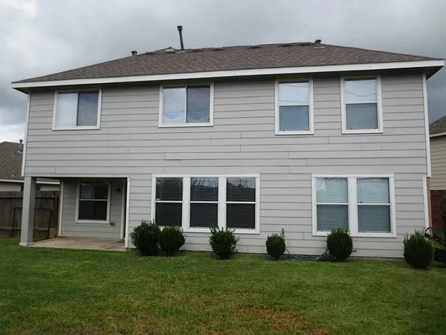 a view of a backyard with a garden
