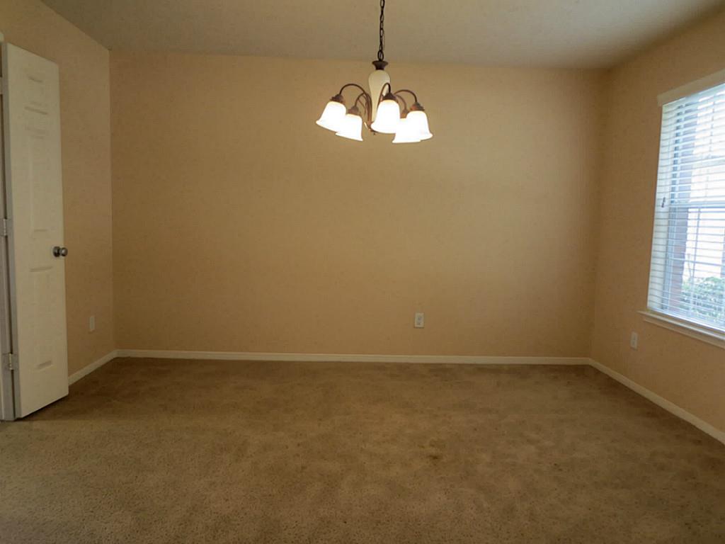 22303 Bridgestone Ridge Drive Spring, TX 77389 - Photo 3 of 25 an empty room with a window