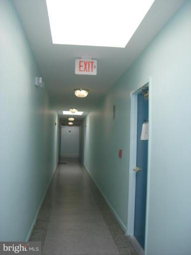 1458 Columbia Road Northwest, Unit 108 Washington, DC 20009 - Photo 4 of 8 a view of a hallway