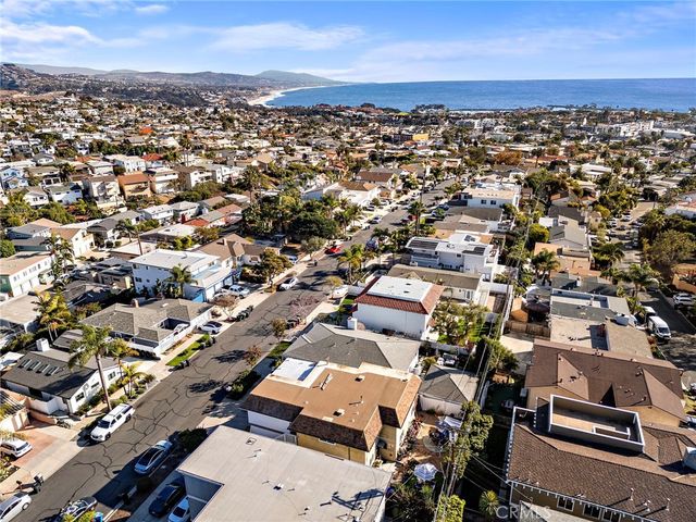 an aerial view of a city with lots of residential buildings