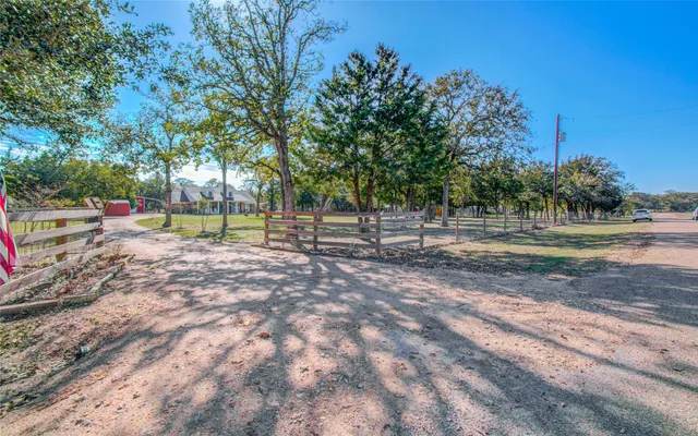 a view of a park with swings and slides