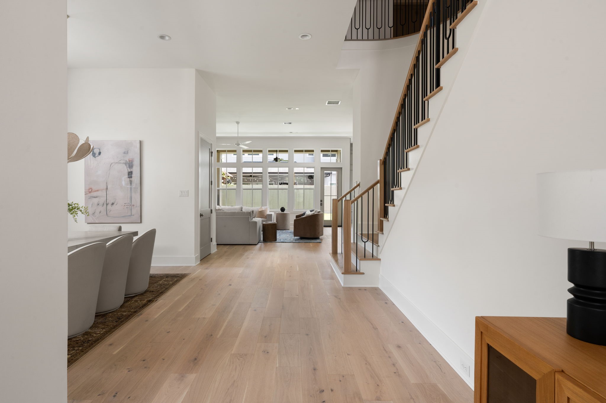1411 Thornton Road Houston, TX 77018 - Photo 4 of 36 a view of hallway with wooden floor and furniture