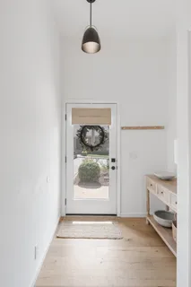 a view of entryway with a hallway