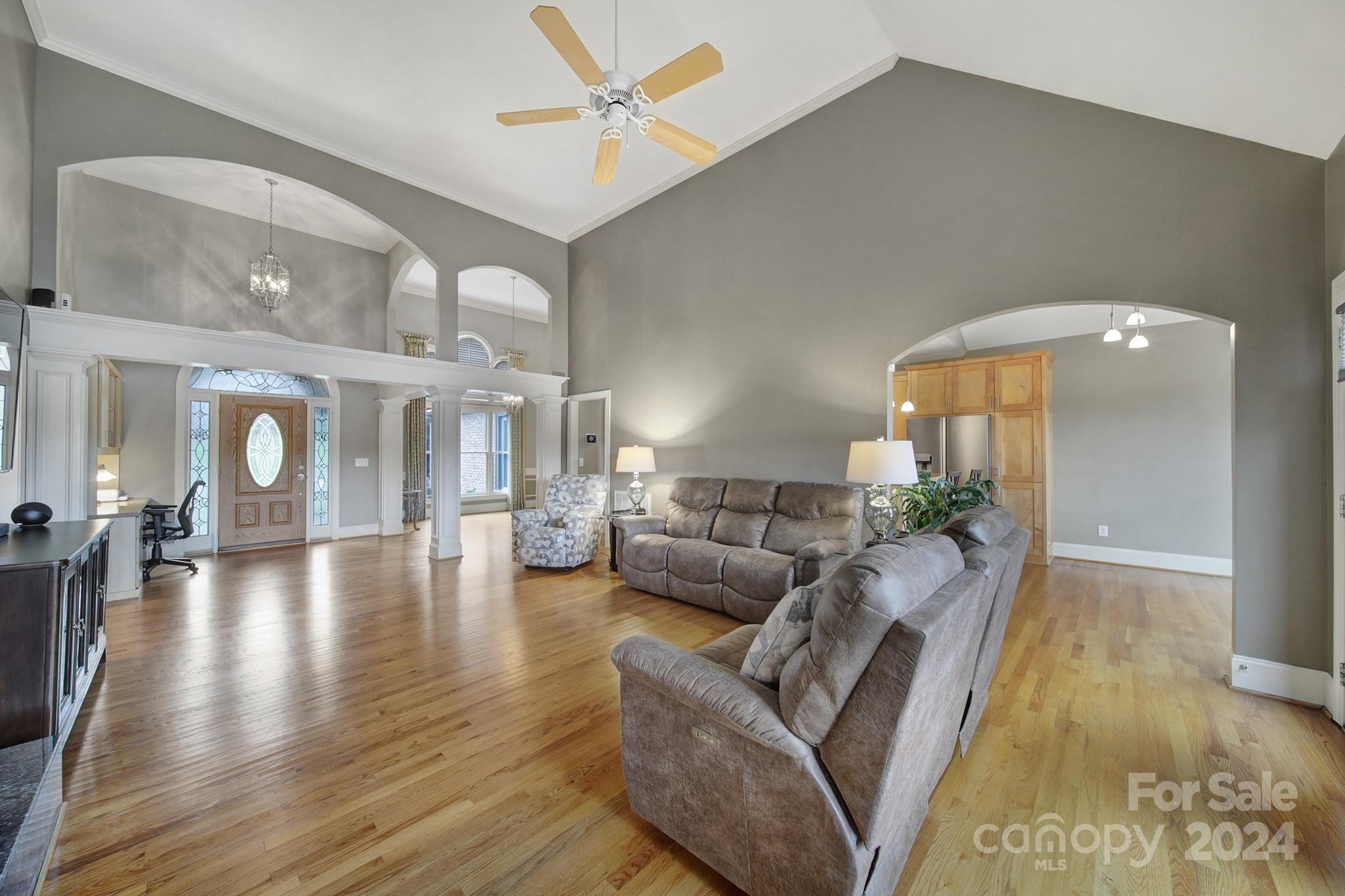 216 Edgewater Way Fort Mill, SC 29708 - Photo 11 of 45 a living room with furniture and a wooden floor