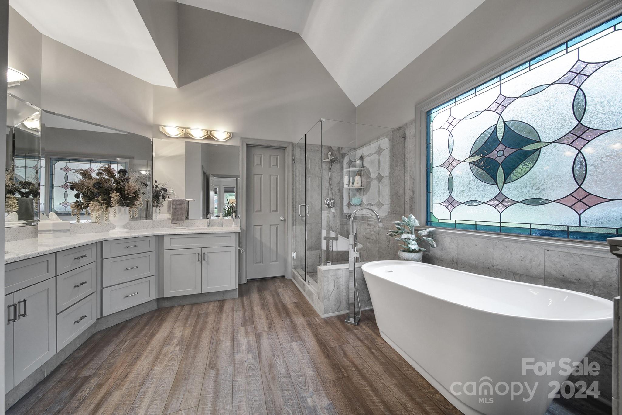216 Edgewater Way Fort Mill, SC 29708 - Photo 22 of 45 a large spacious bathroom with a large tub and sink
