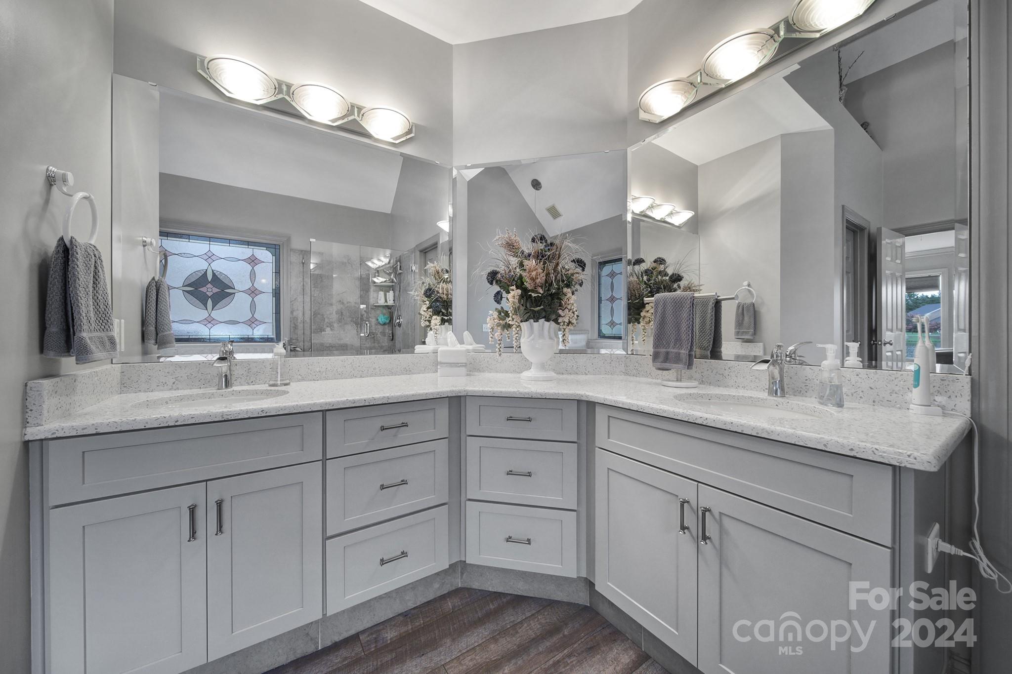 216 Edgewater Way Fort Mill, SC 29708 - Photo 23 of 45 a bathroom with double sink and a mirror