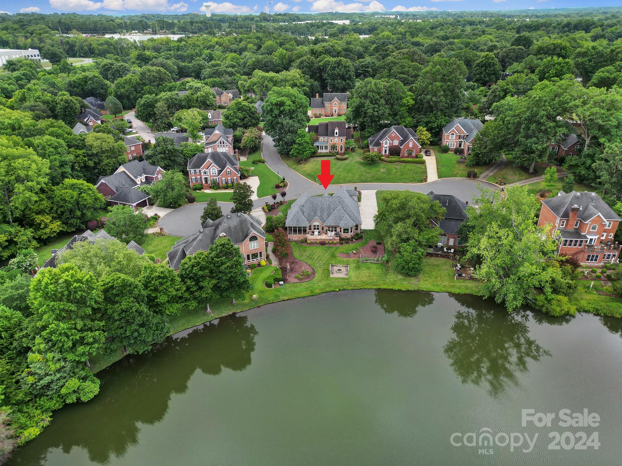 216 Edgewater Way Fort Mill, SC 29708 - Photo 3 of 45 an aerial view of a houses with a lake view