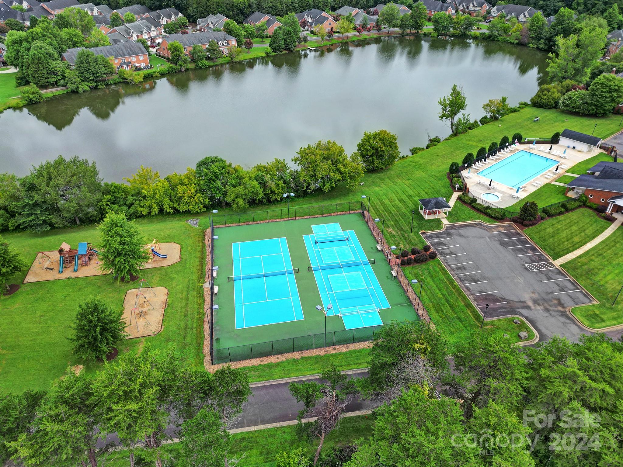 216 Edgewater Way Fort Mill, SC 29708 - Photo 34 of 45 an aerial view of a house with swimming pool and outdoor space