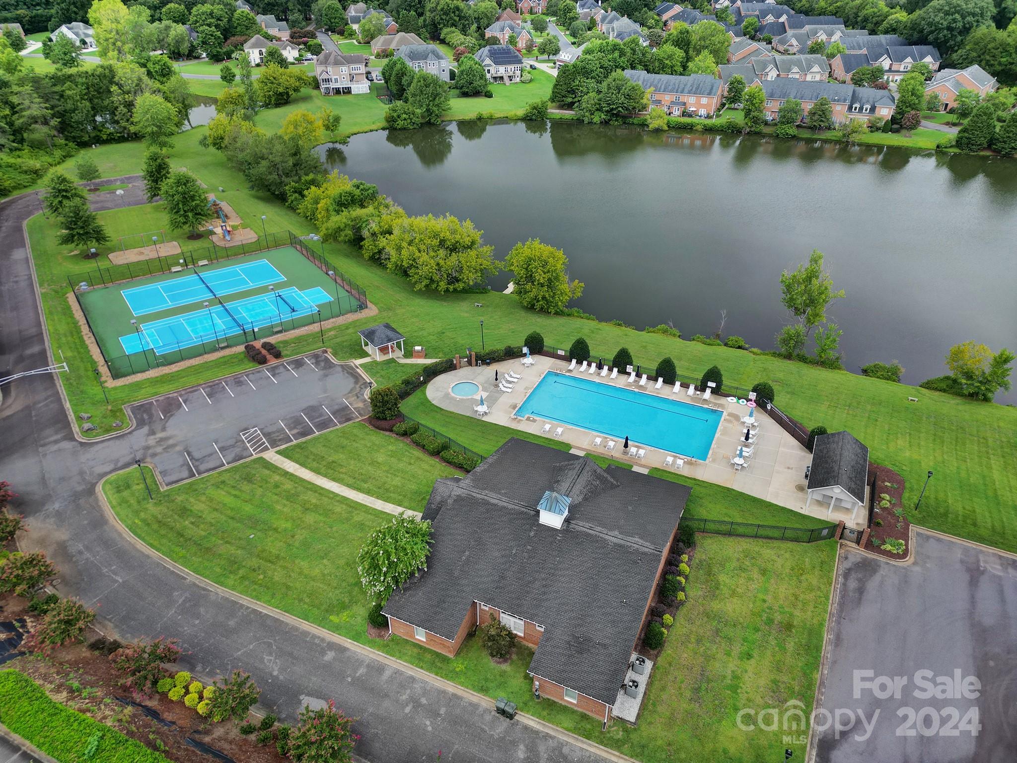 216 Edgewater Way Fort Mill, SC 29708 - Photo 35 of 45 an aerial view of a house with a lake view