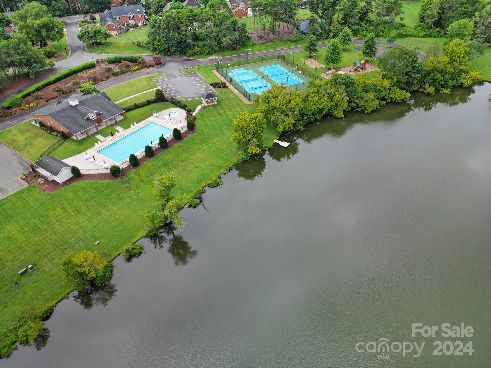 216 Edgewater Way Fort Mill, SC 29708 - Photo 37 of 45 an aerial view of a house with a garden and swimming pool