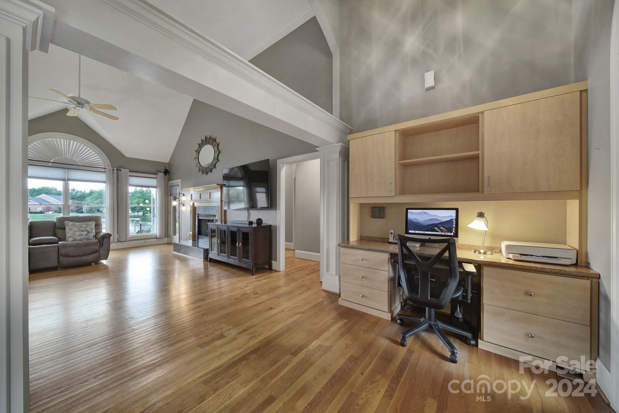 216 Edgewater Way Fort Mill, SC 29708 - Photo 6 of 45 a view of a workspace with furniture and wooden floor