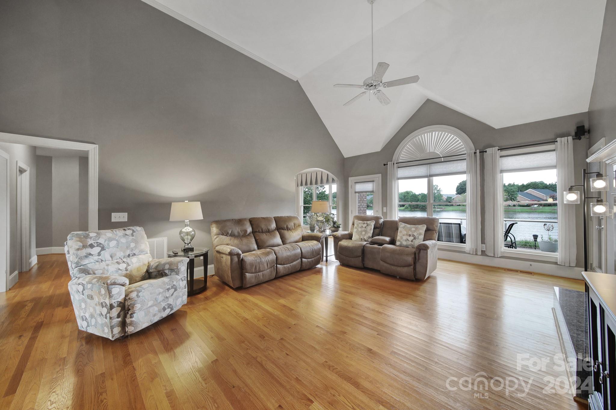 216 Edgewater Way Fort Mill, SC 29708 - Photo 10 of 45 a living room with furniture and a large window