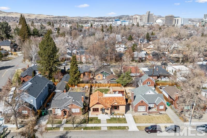 643 John Fremont Drive Reno, NV 89509 - Photo 3 of 42 an aerial view of residential houses with outdoor space
