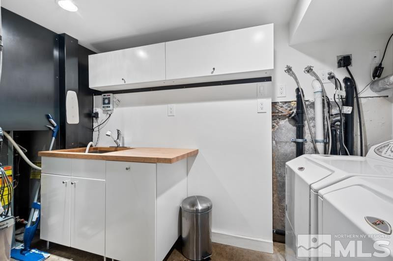 643 John Fremont Drive Reno, NV 89509 - Photo 33 of 42 a utility room with dryer and washer