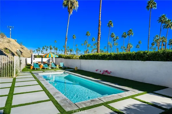 a view of a house with a swimming pool