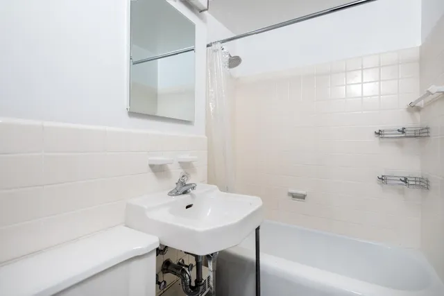 a kitchen with a stove and a microwave