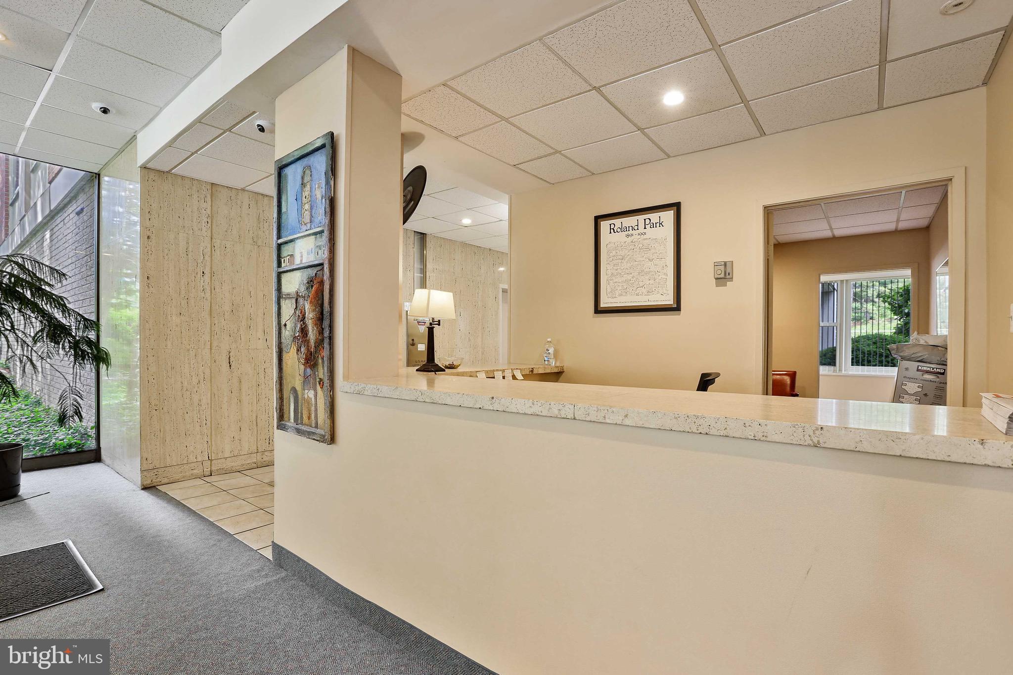 4401 Roland Avenue, Unit 306 Baltimore, MD 21210 - Photo 25 of 34 Front Desk