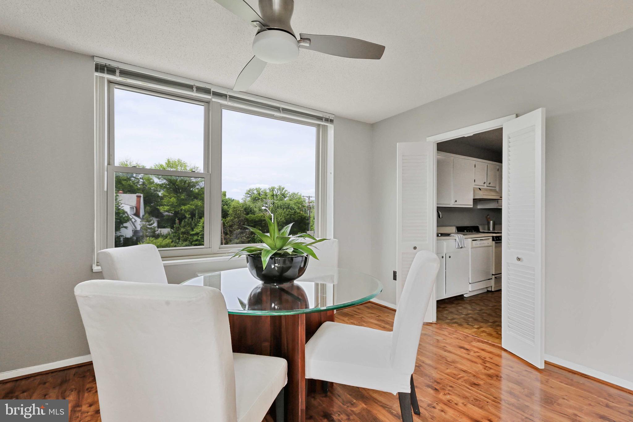 4401 Roland Avenue, Unit 306 Baltimore, MD 21210 - Photo 7 of 34 Light Filled Dining Room