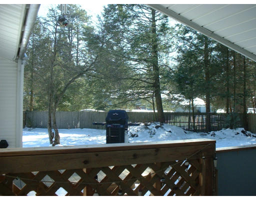 47 Ellendale Circle Springfield, MA 01128 - Photo 6 of 6 a view of a back yard from a balcony