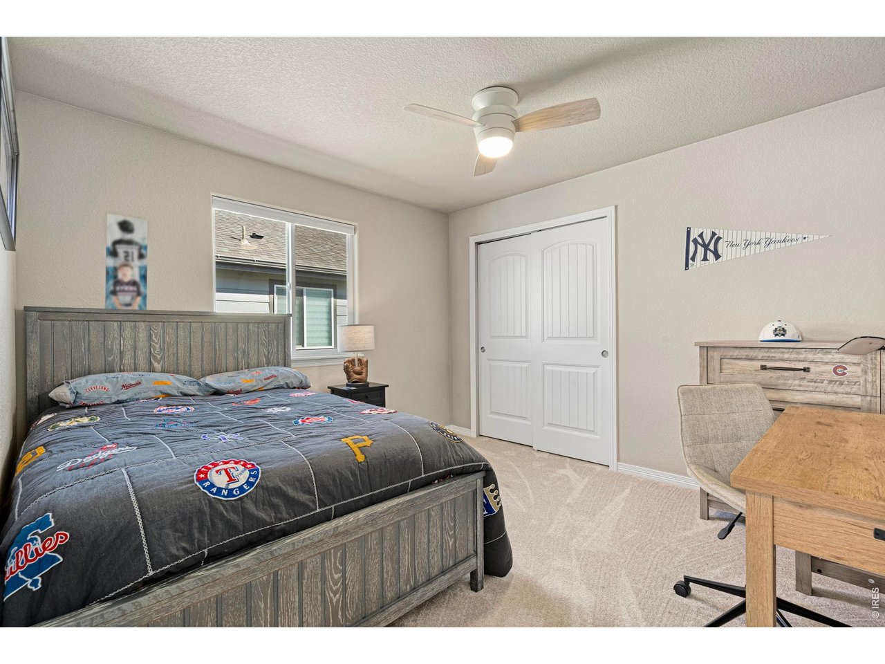 5492 Bristow Road Timnath, CO 80547 - Photo 13 of 25 Main level includes three well-appointed bedrooms